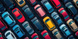 Overhead view of many different cars standing in rows in parking lot. Multicolored cars, texture wallpaper. Background for car dealership banner. 
