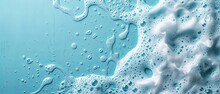 Spot Of Thick Shampoo Foam On A Blue Background