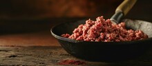 spoonful of freshly cooked ground beef from iron skillet. Copy space image. Place for adding text