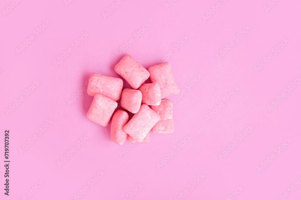 Chewing gums on pink background