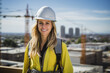 Portrait of a Focused Woman Building Inspector Overlooking a Bustling City Construction Site