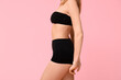 © Pixel-Shot - Sexy young woman in black underwear on pink background