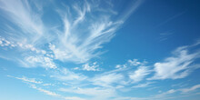 A Blue Sky With Scattered Cirrus Clouds