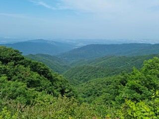 Canvas Print - Blue sky and mountains seen from the top