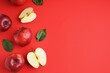canvas print picture - Fresh red apples and leaves on color background