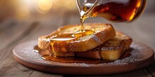 Pouring Syrup On Fresh Baked French Toast Breakfast
