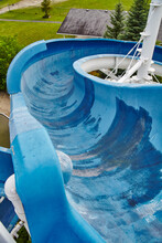 Empty Water Slide At Recreational Park, Overcast Day Perspective