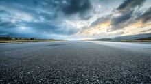 Asphalt Road And Dramatic Sky With Clouds At Sunset. Nature Background.