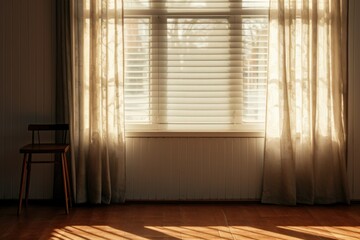 Poster - A chair placed in front of a window, ideal for creating a cozy reading nook or enjoying the view