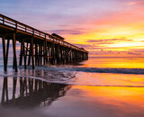 Fototapeta Zachód słońca - Sunrise and Wooden Pier on Fernandina Beach, Amelia Island, Florida, USA
