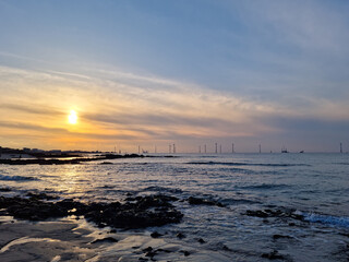 Sticker - This is the sunset view of Gwakji Beach in Jeju Island.