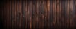 Dark brown wooden plank background, wallpaper. Old grunge dark textured wooden background, The surface of the old brown wood texture, top view brown pine wood paneling.