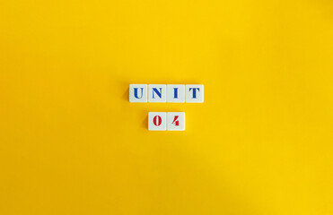 Wall Mural - unit 4. text on block letter tiles and icon on flat background. minimalist aesthetics.