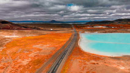 Wall Mural - Aerial view of Blue lake made from water coming out of geothermal power plant from above, Iceland