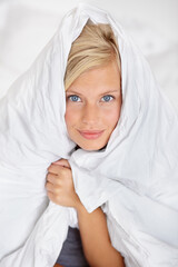 Sticker - Bed, portrait and blanket to cover woman in morning or home with warm sheet on body. Cosy, girl and duvet on head of person to wake up on holiday or vacation wrapped in linen for comfort in bedroom