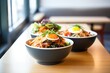 bowls of korean bibimbap ready for lunchtime customers