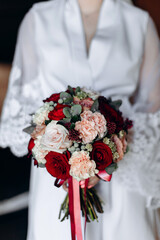 Wall Mural - Wedding flowers. Bridal bouquet with exotic flowers. Bride holding a bouquet. wedding details. soft focus