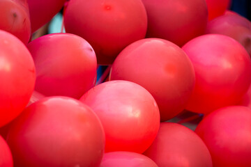 Wall Mural - Red balloons for party in the park. Abstract background.