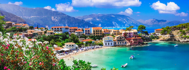Wall Mural - Greece  travel. One of the most beautiful traditional greek villages - scenic Assos in Kefalonia (Cephalonia) with colorful floral streets. Ionian islands , popular tourist destination .