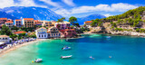Fototapeta Most - Greece  travel. One of the most beautiful traditional greek villages - scenic Assos in Kefalonia (Cephalonia) with colorful floral streets. Ionian islands , popular tourist destination