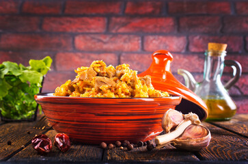 Sticker - Tagine with traditional uzbek pilaf on a table