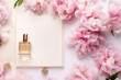 © Anastasiia Ignateva - Flat Lay Composition with Pink Blossoms. Overhead view of perfume bottle among pink peonies on a flat lay composition, ideal for beauty and romantic themes.