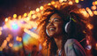 Portrait of overjoyed african american woman with headset enjoying outdoor party or event, listening to music on silent stage at festival.