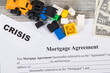 Mortgage agreement form, inscription crisis and money. High prices building or purchase home and crisis on real estate market