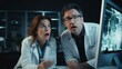 © junky_jess - Two surprised scientists man and woman in eyeglasses looks at screen at laboratory with astonished facial expression.