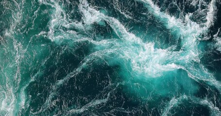 blue waves of water of the river and the sea meet each other during high tide and low tide.