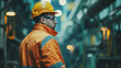 © Synaptic Studio - Heavy industry worker wearing hard hat and safety uniform. The engineer carries out maintenance operations on the factory machinery.