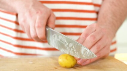 Poster - Young Man Enthusiastically Preparing Dinner in Modern Kitchen