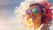 © sugastocks - a young woman dressed in rainbow sunglasses
