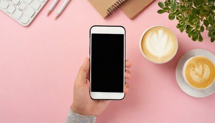 Hand using smartphone with blank screen, isolated on pink background