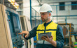 © lovelyday12 - worker and engineer using tablet computer for inspection and checking production process on factory station