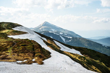 Wall Mural - Sunny day in spring Carpathian mountains with highest peak of Ukraine - Hoverla (2 061 m). Landscape photography