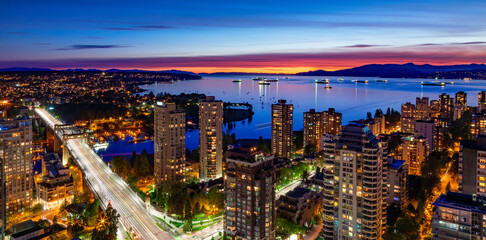 Wall Mural - Downtown Vancouver Cityscape on West Coast of Pacific Ocean. Night after Sunset. Aerial Panorama