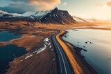 Fototapeta  - scenic road in Iceland, beautiful nature landscape aerial panorama, mountains and coast at sunset
