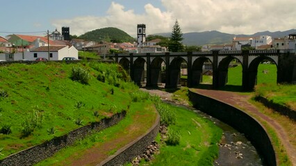 Poster - Aerial shot, drone point of view of Ribeira Grande town in the Ponta Delgada island. Sao Miguel, Azores, Portugal. Travel destinations and tourism concept