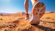 runner's shoes on a desert trail, with sandy dunes and a clear blue sky in the background generative ai
