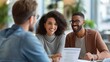 © ArtCookStudio - A Joyful Multiracial Couple Presenting Their Documents to an Insurance Agent at an Office Meeting