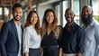 © ArtCookStudio - A Multiracial Business Team in the Office, Smiling at the Camera