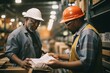 Group of confident warehouse workers in protective hats checking documents while working together