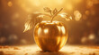 Golden shining apple fruit with leaves on a golden yellow background. Forbidden fruit is the sweetest.