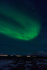 Polar lights on s´the winter sky in winter in Norway