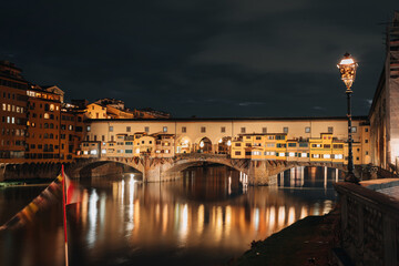 Wall Mural - Ponto Vecchio bridge, one of the symbols of Florence. Medieval bridge in the evening.