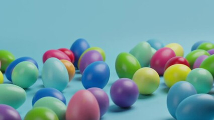 Wall Mural - Pastel easter eggs fallen on blue background.