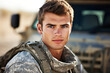 Portrait of a handsome young soldier standing in front of his car