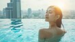© Sasint - Portrait beautiful young asian woman smile relax leisure around outdoor swimming pool with city view