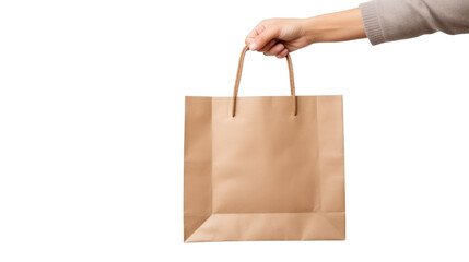 Close up female holds in hand brown clear empty blank craft paper bag isolated on transparent and white background.PNG image.